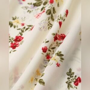 The Elasticized Shoulder Straps Floral Dress from Rihoas in small.